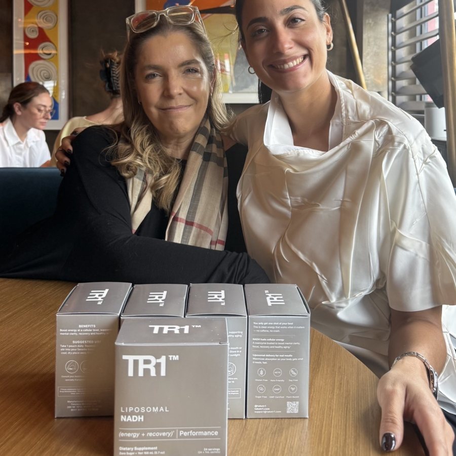 Two women with TR1 boxes