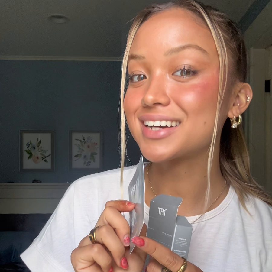 Julia holding a TR1 sachet