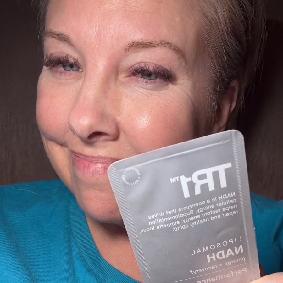 TR1 customer smiling with a sachet